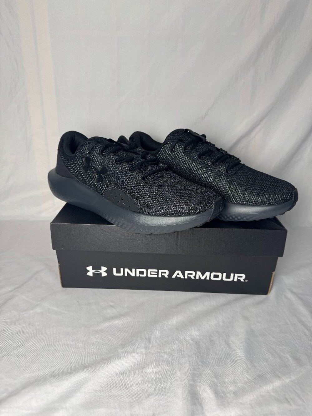 Under Armour Charged Surge 4 Men's Size 12 Black Running Shoes Sneakers NEW